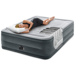 Inflatable air mattress with a person lying on it on a white background