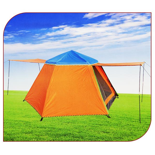 Hexagonal spring automatic tent with AL QADAH branding on a grassy field.